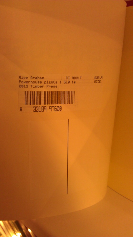 An example of a book belonging to the St. Louis Public Library with a very simple system, containing only a barcode and title indications. 